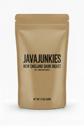 JavaJunkies New England Dark Roast — bold black lettering on kraft brown paper packaging