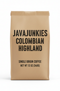 JavaJunkies Colombian Highland — bold black lettering on kraft brown paper packaging